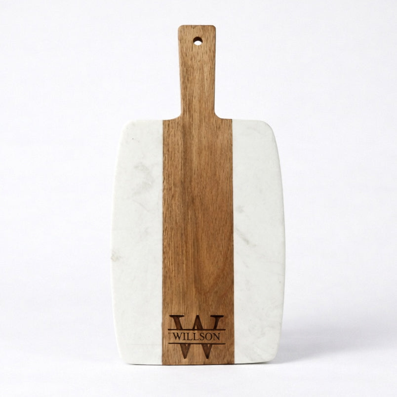 Medium marble and wood cutting board with handle, featuring a initial monogram