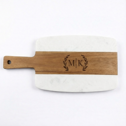 Medium marble and wood cutting board with handle, featuring a couple’s two-initial monogram