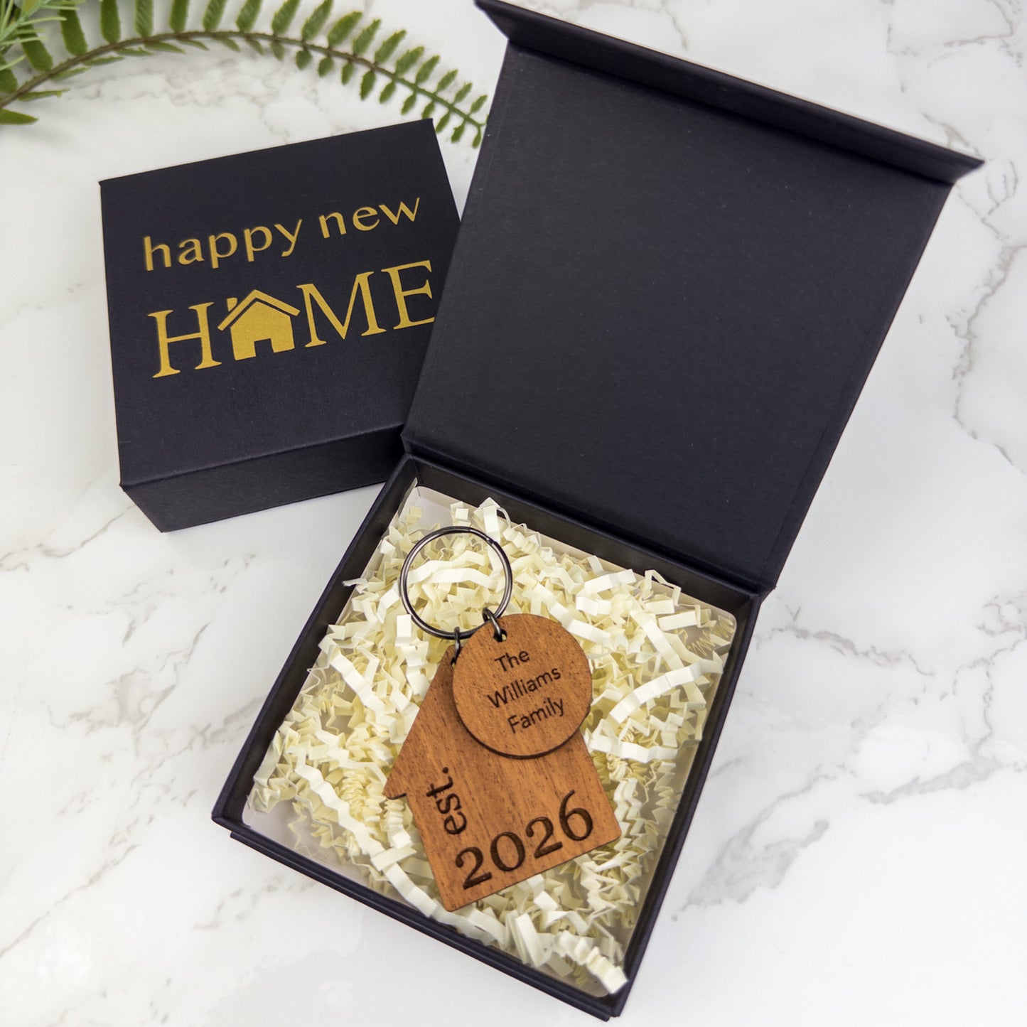 Happy new home box with a keychain in it - closing gift